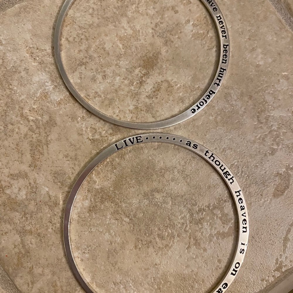 Two sterling silver stamped bracelets